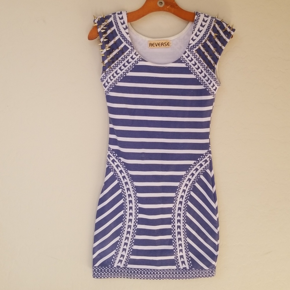 Reverse spike shoulder dress